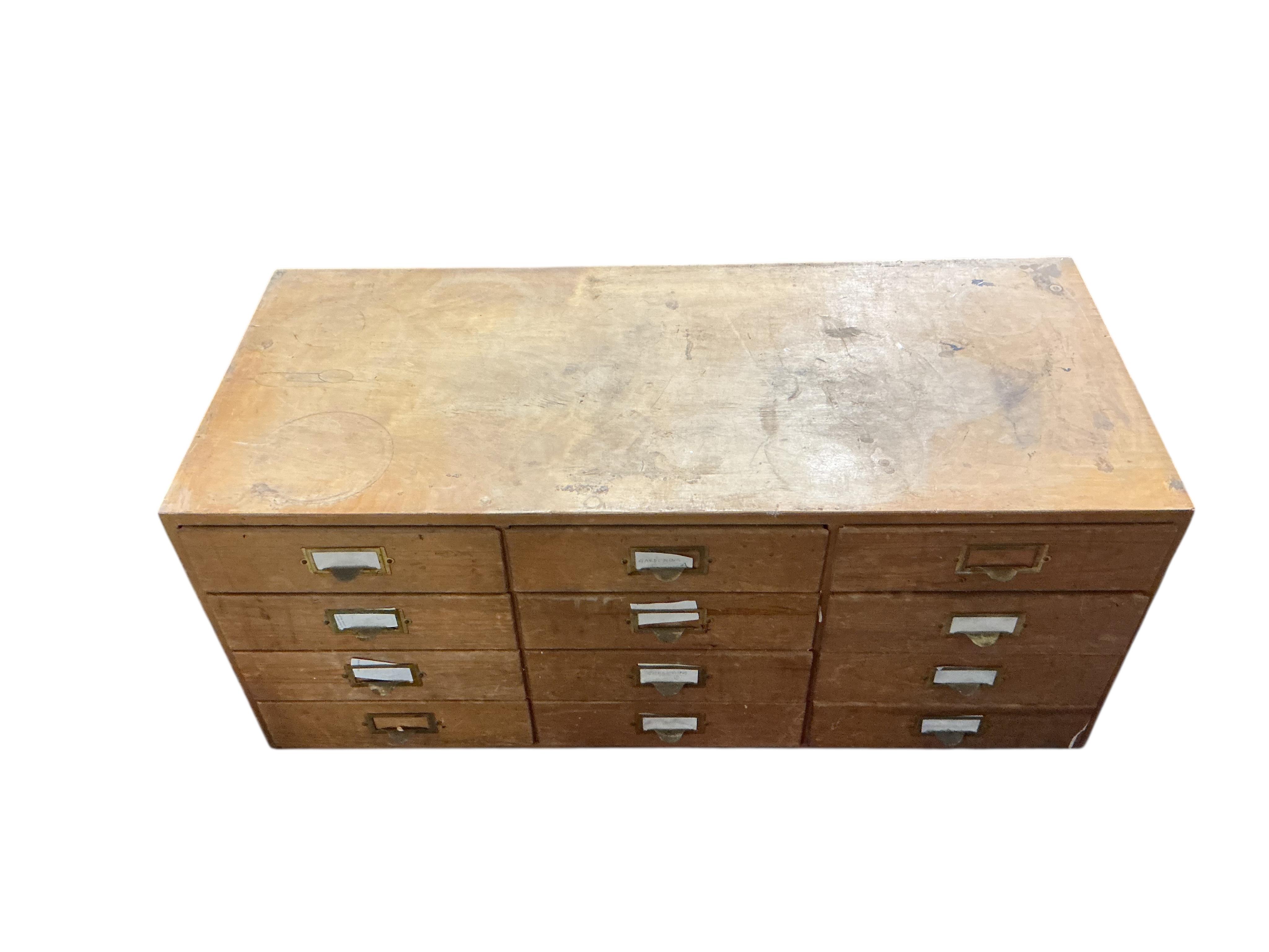Two mid century pine and ply banks of nine drawers, each width 103cm, depth 45cm, height 43cm